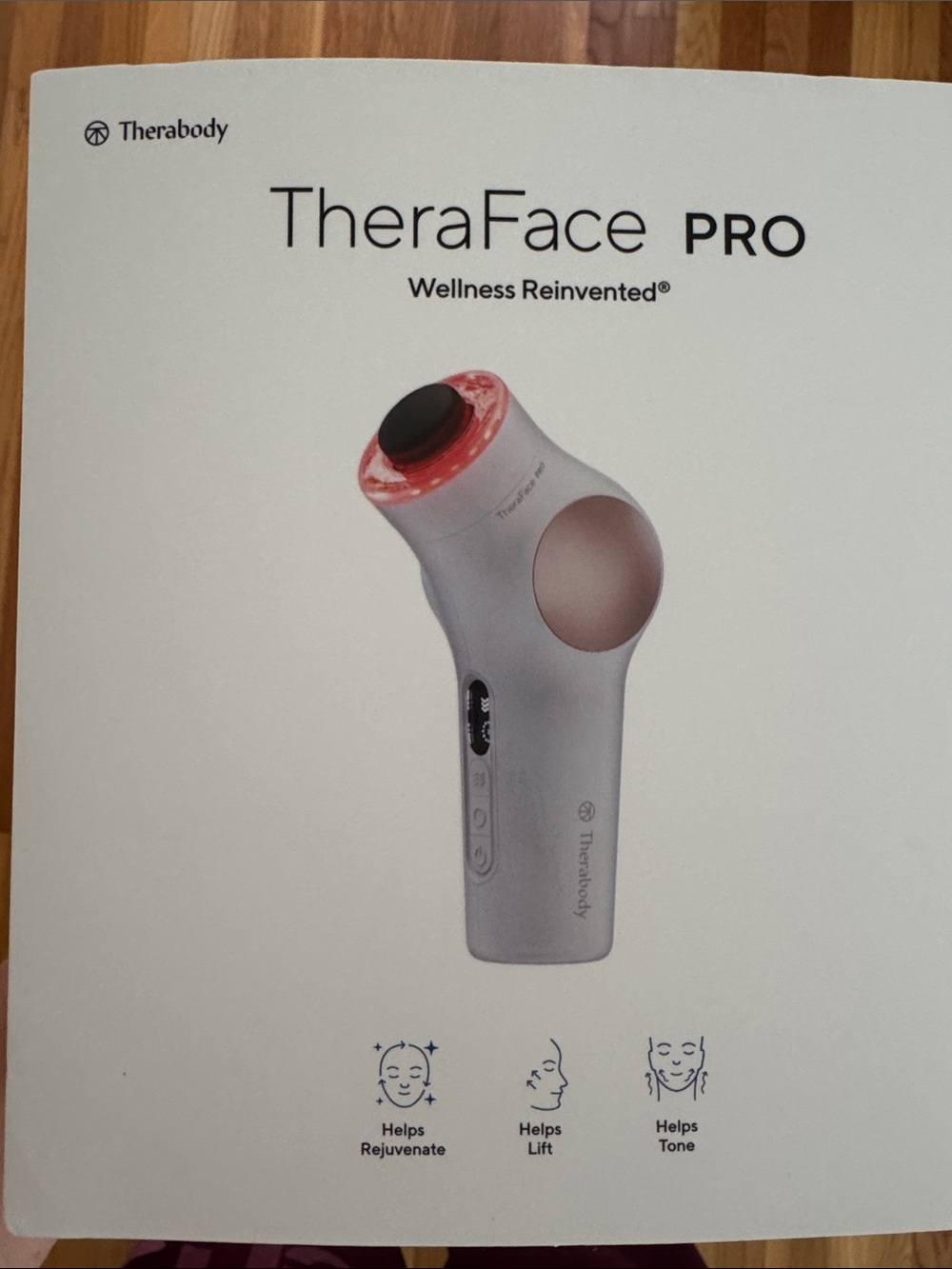 Therabody TheraFace PRO in White with Gold Accents